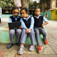 School children learn to count with YaNetu, and AI-driven teaching tablet.